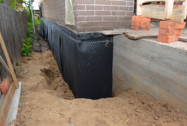 Happy homeowners after waterproofing job in Mundelein